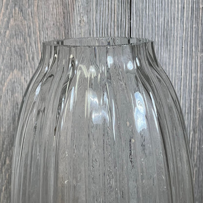 Large clear glass vase with simple striped design, perfect for farmhouse decor and centerpiece flower arrangements.
