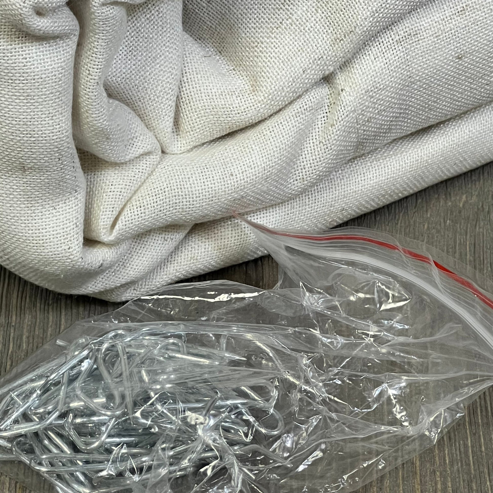Cream linen semi-sheer extra wide curtains with metal hooks, ideal for sliding glass doors.
