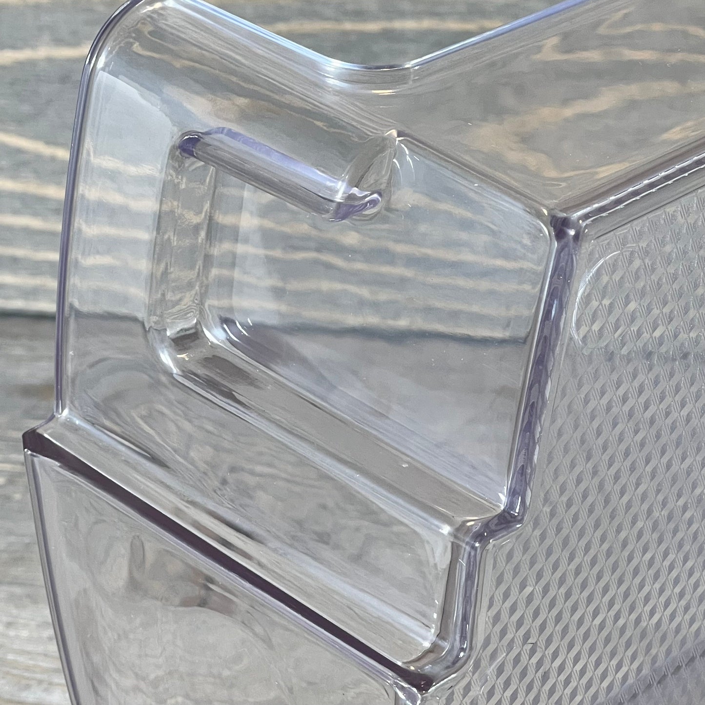 Clear plastic Refrigerator Door Shelf Bin MAN63948502, compatible with LG and Kenmore models, close-up view.