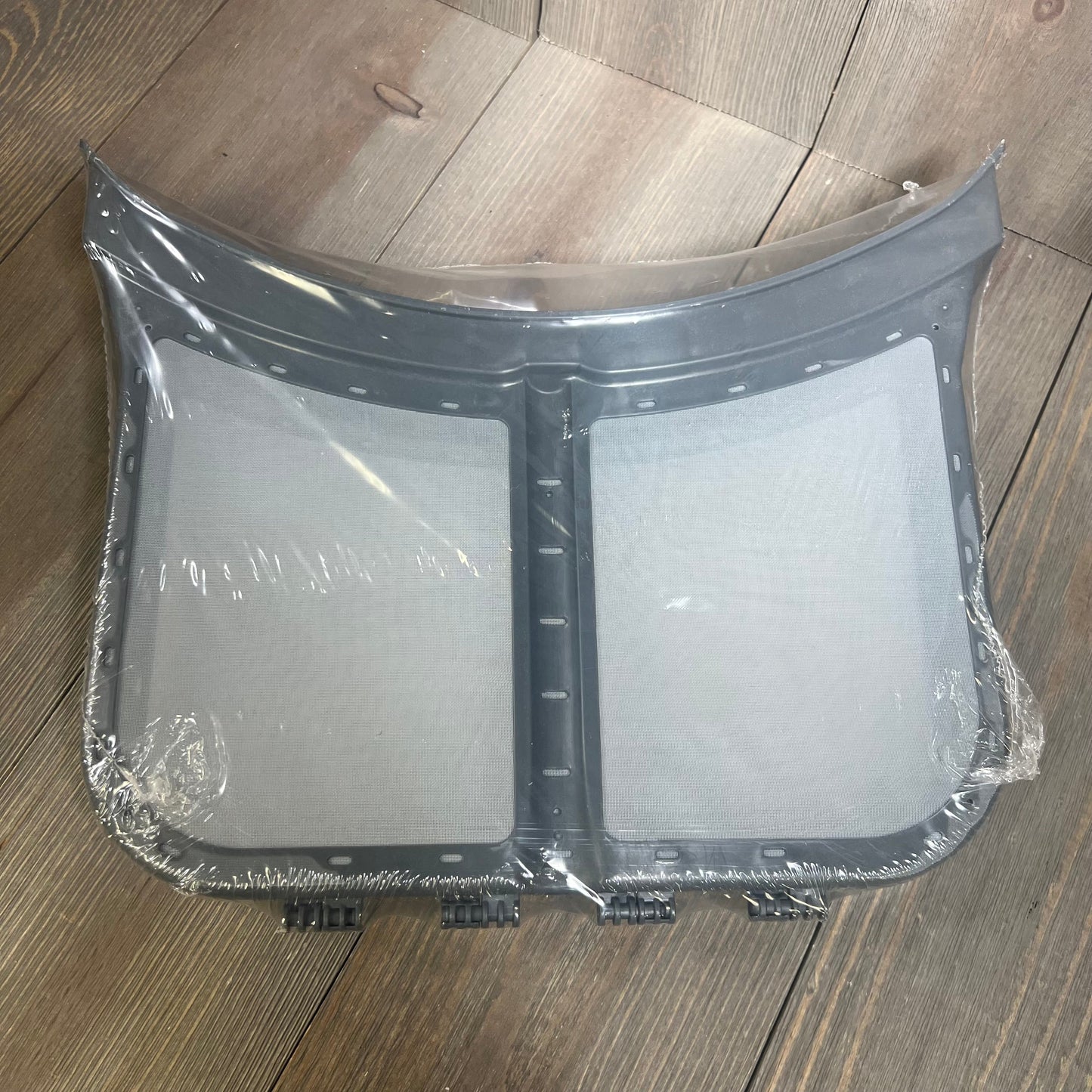 Replacement screen filter for dryers, compatible with Frigidaire, Electrolux, Kenmore; shown in protective wrap.