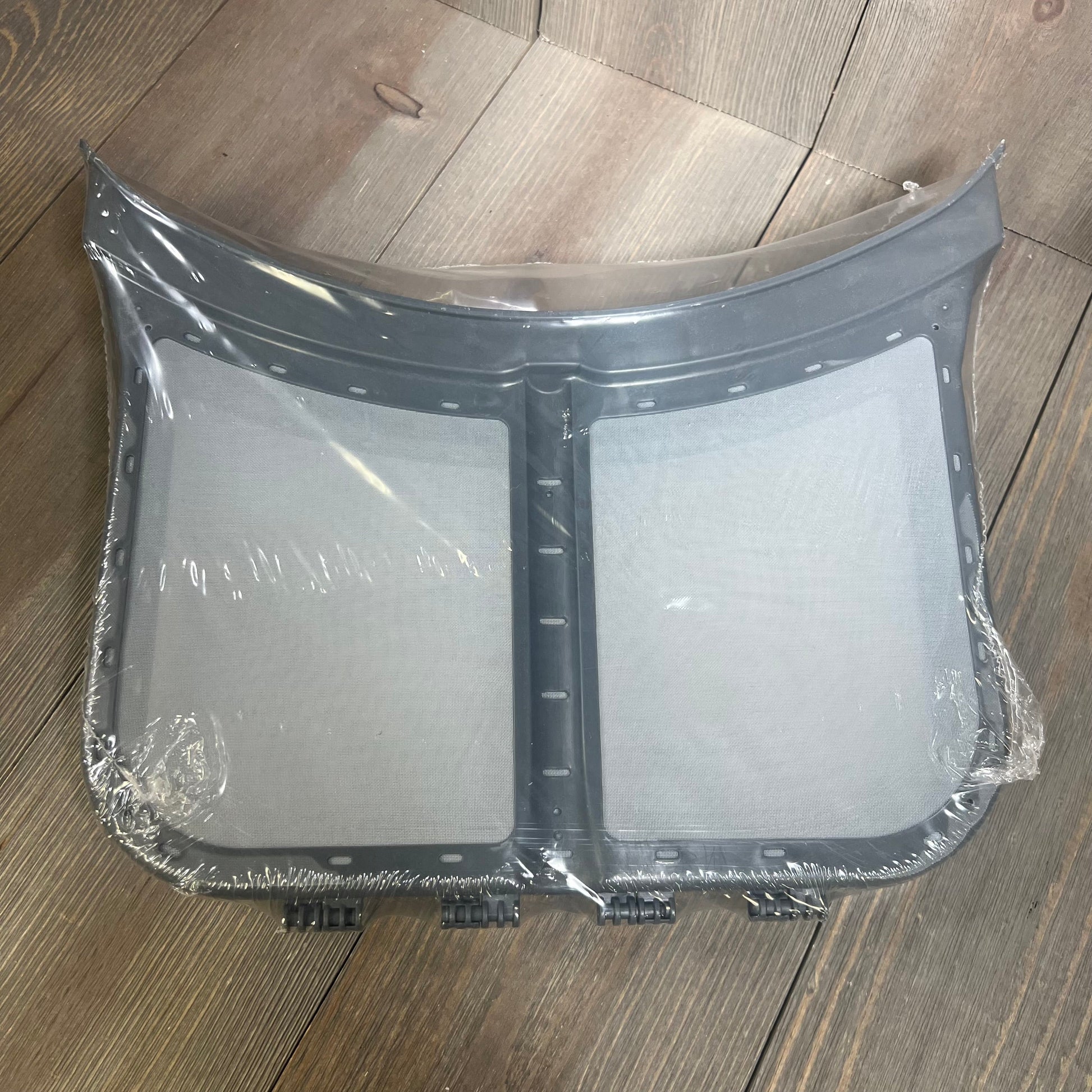 Replacement screen filter for dryers, compatible with Frigidaire, Electrolux, Kenmore; shown in protective wrap.