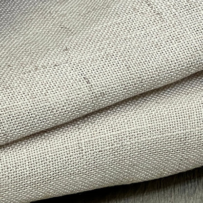 Close-up of H.VERSAILTEX linen fabric showcasing texture and weave, ideal for semi-sheer light-filtering curtains.
