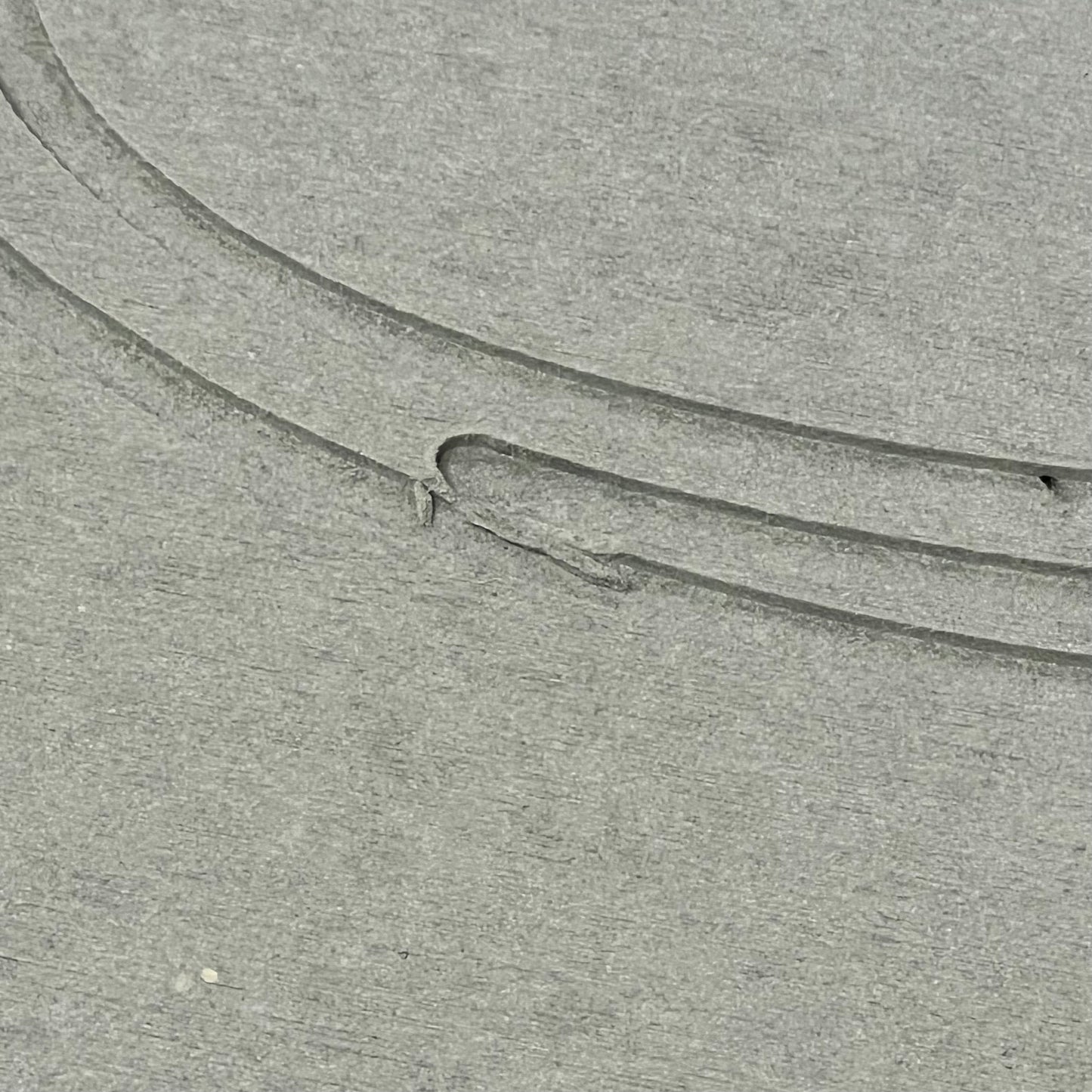Close-up of ENERGYLOGO grey stone bath mat texture, showcasing non-slip surface and quick-drying diatomaceous earth material.