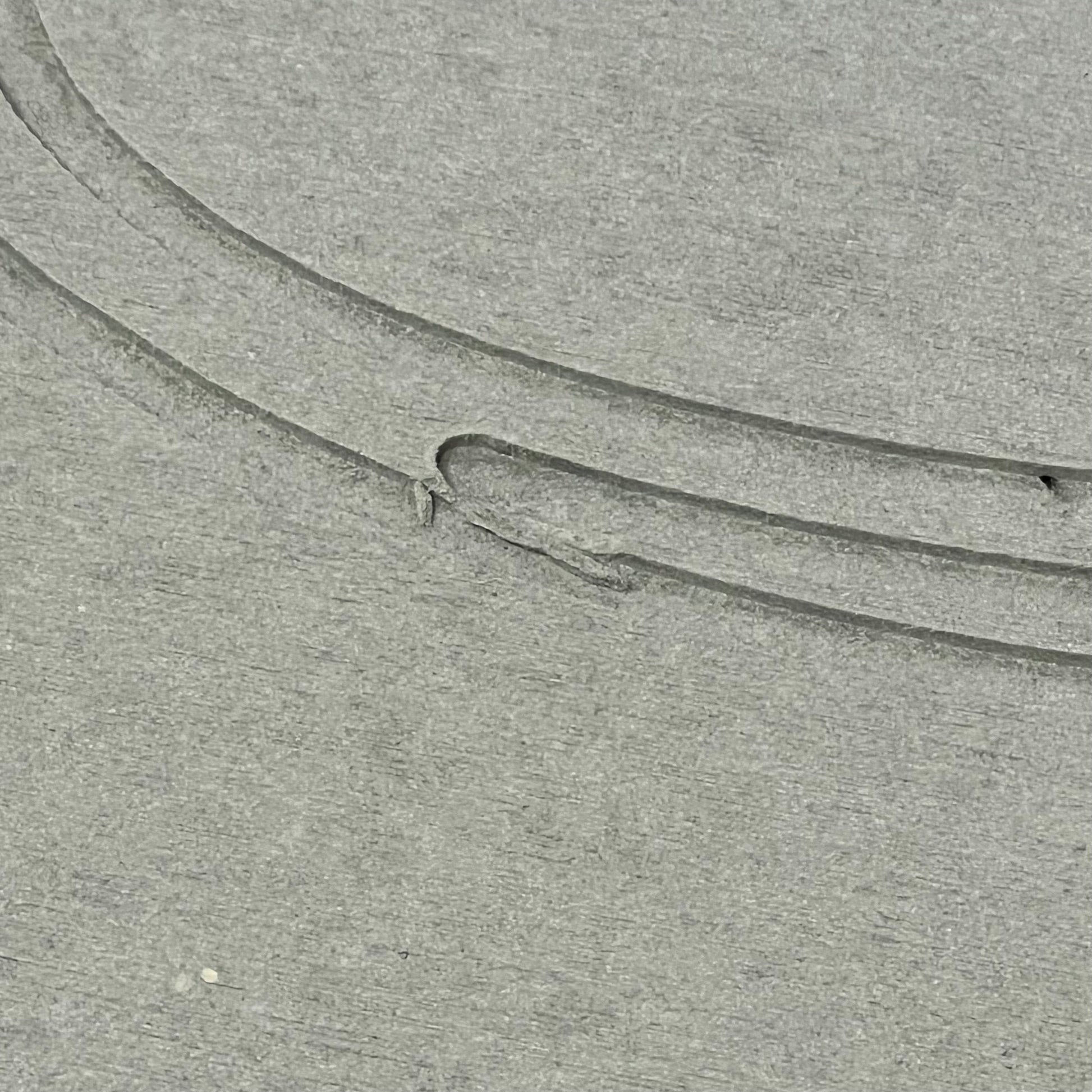 Close-up of ENERGYLOGO grey stone bath mat texture, showcasing non-slip surface and quick-drying diatomaceous earth material.