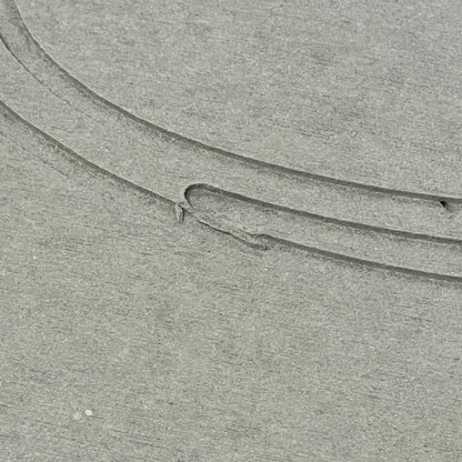 Close-up of ENERGYLOGO grey stone bath mat texture, showcasing non-slip surface and quick-drying diatomaceous earth material.