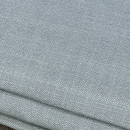 Linen-textured grey tablecloth, wrinkle-free and spill-proof, showcasing premium fabric quality for dining elegance.