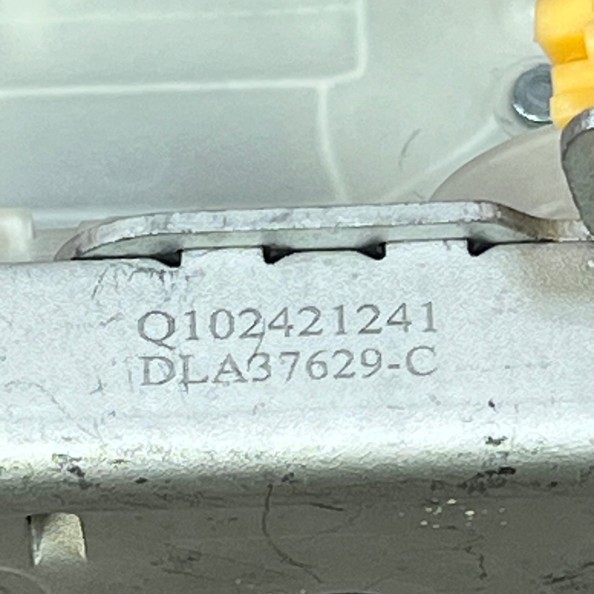 Premium door latch lock actuator for Ford Edge & Lincoln MKX, front right passenger side, detailed view of part number.