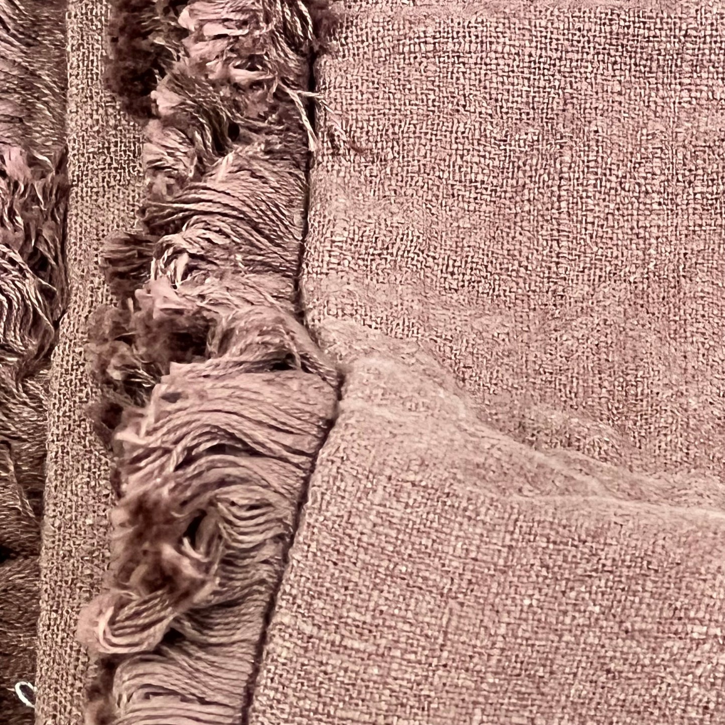 Dark coffee linen throw pillow cover with fringe and tassels, perfect for boho farmhouse decor on couch or bed.