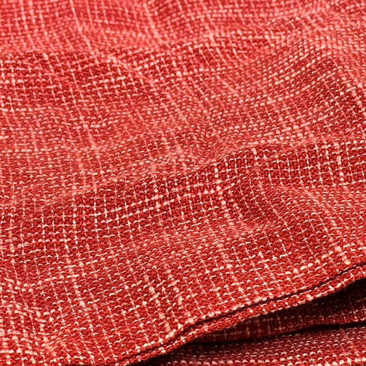 Close-up of burnt brick faux linen fabric texture from Kevin Textile pillow cover, showcasing detailed weave pattern.