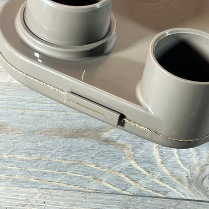 Close-up of a top manifold replacement for Hayward Swim Clear cartridge filter on a wooden surface.