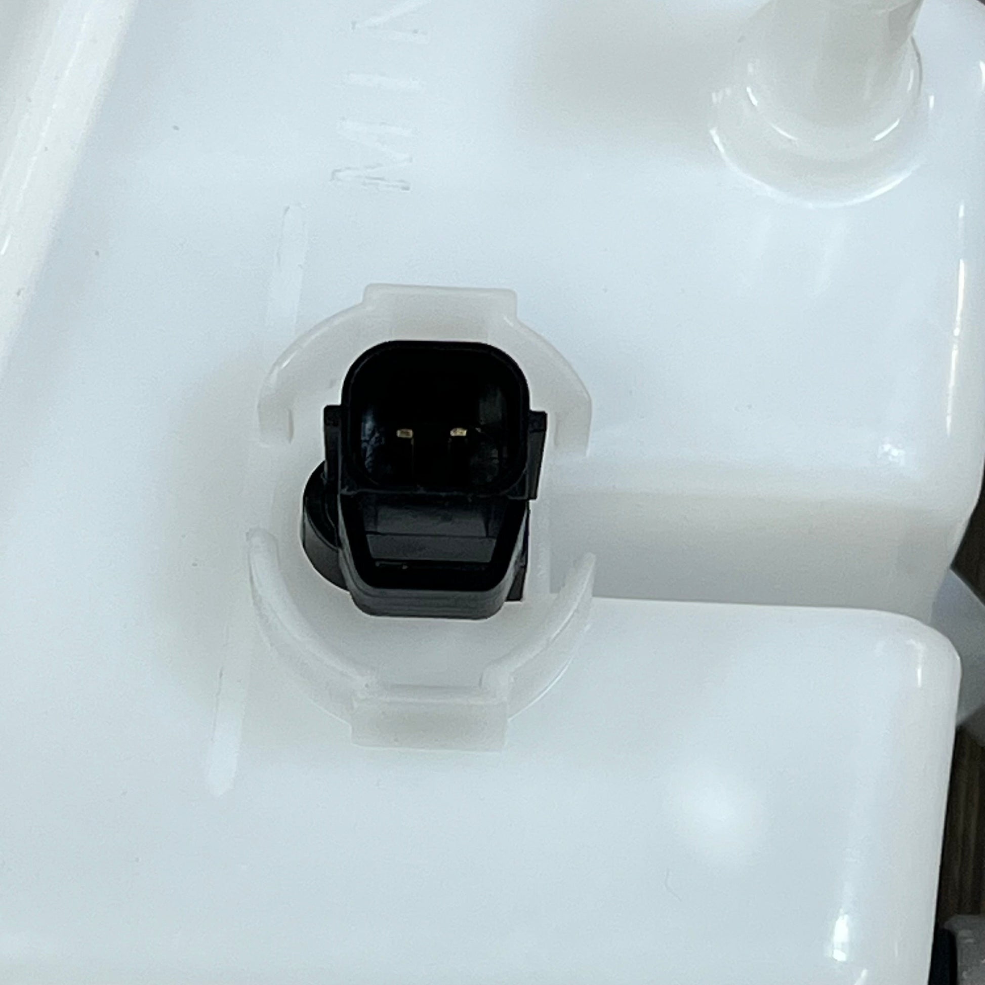 Close-up of the Tuckbold Brake Master Cylinder reservoir connector for Kia Rio 2006-2011, showcasing durable design.