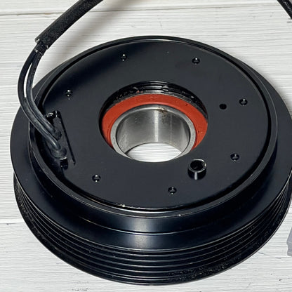 Close-up of the uxcell AC Compressor Clutch Set for Mazda 3, showcasing detailed design compatible with 2010-2013 models.