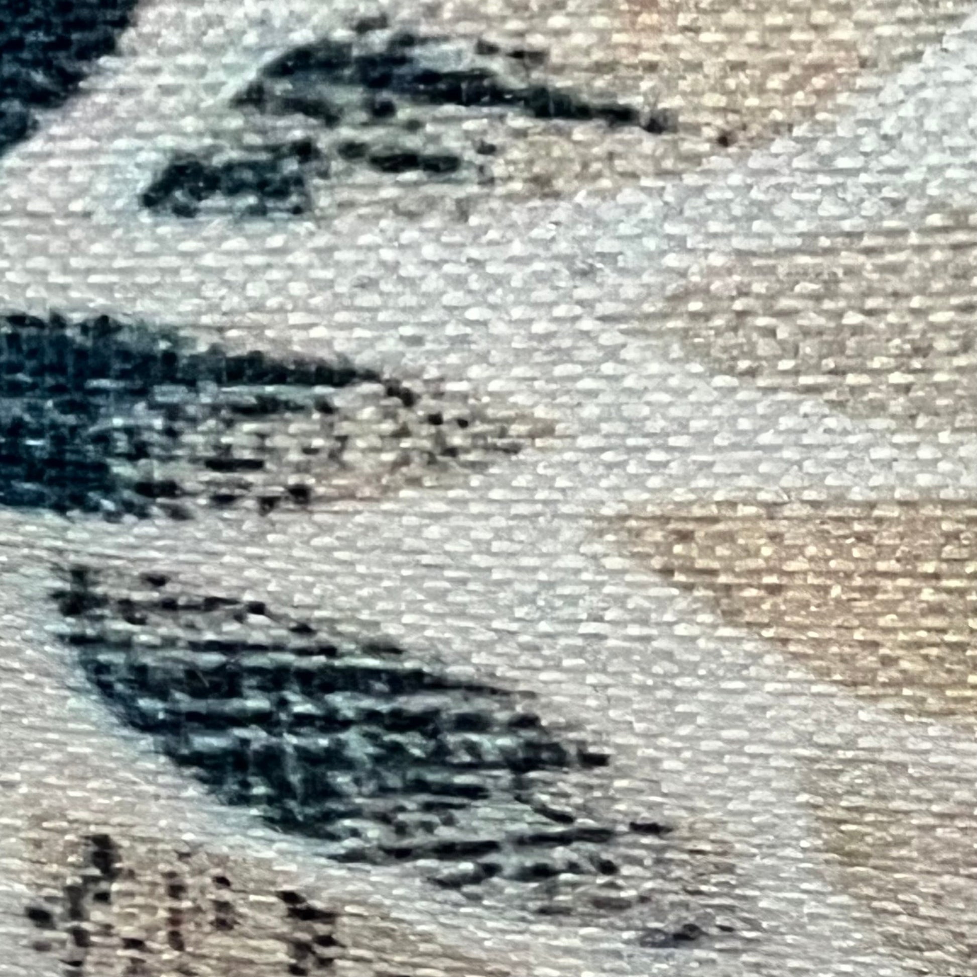 Close-up of navy blue cream dahlia lumbar pillow cover fabric, showcasing rustic geometric floral design and linen texture.