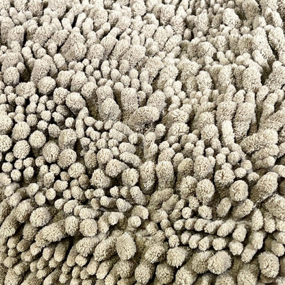 Soft, thick microfiber chenille texture of Yimobra bath mat in pale khaki, perfect for bathroom comfort and style.