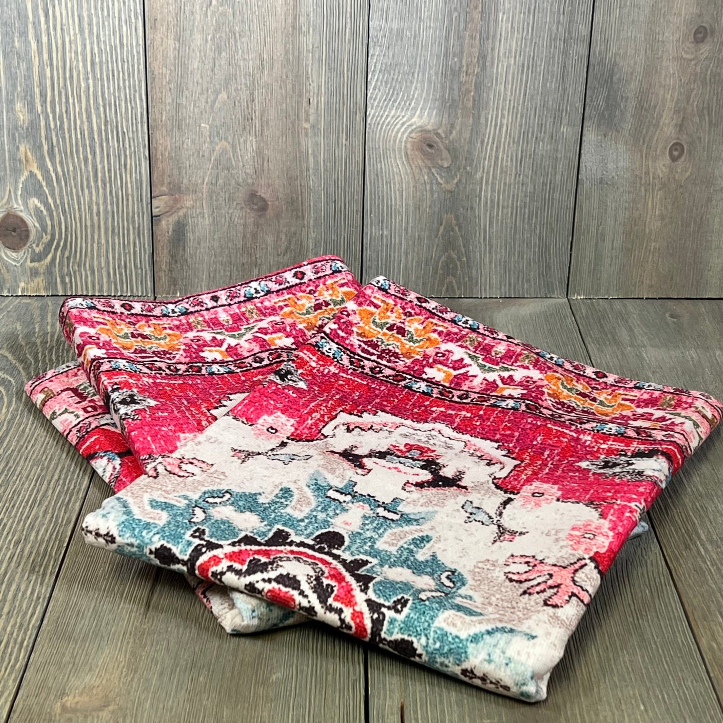 Boho throw pillow covers with vibrant red and multicolor patterns, perfect for enhancing sofa or bed decor.