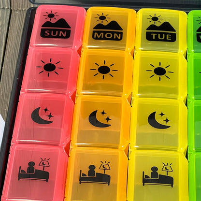 Colorful extra large weekly pill organizer with four daily compartments, perfect for vitamins and supplements.
