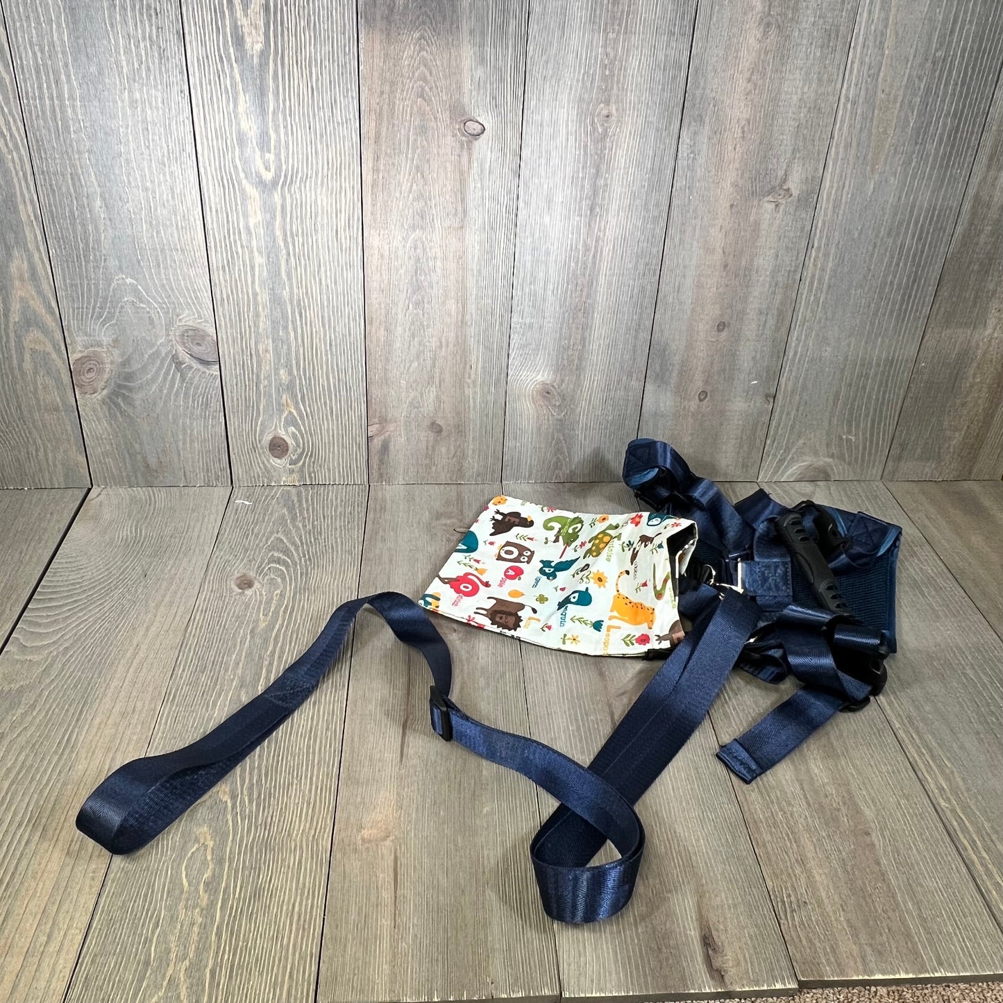 Colorful child safety harness with adjustable leash and autism awareness print, ideal for active kids aged 3-6.