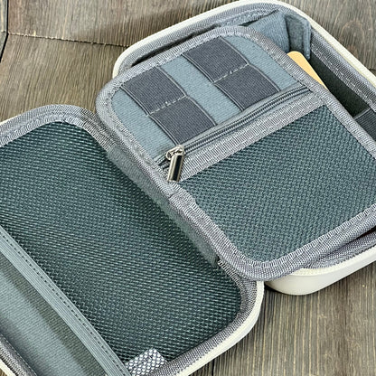 Beige K&F Concept camera bag interior with secure mesh pockets and multiple compartments for organized storage.