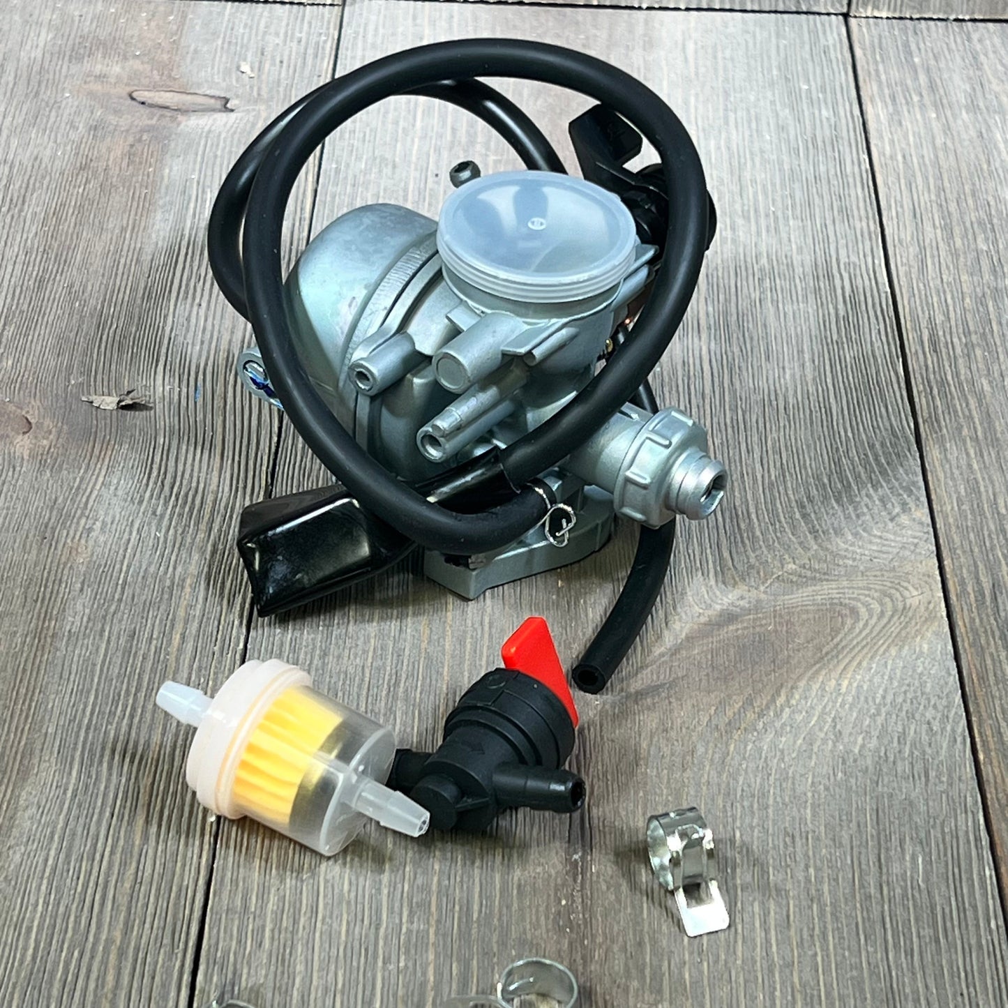 Replacement carburetor for Honda TRX 90EX Sportrax Fourtrax 1993-2006, featuring hoses and clamps, model 16100-HP2-673.