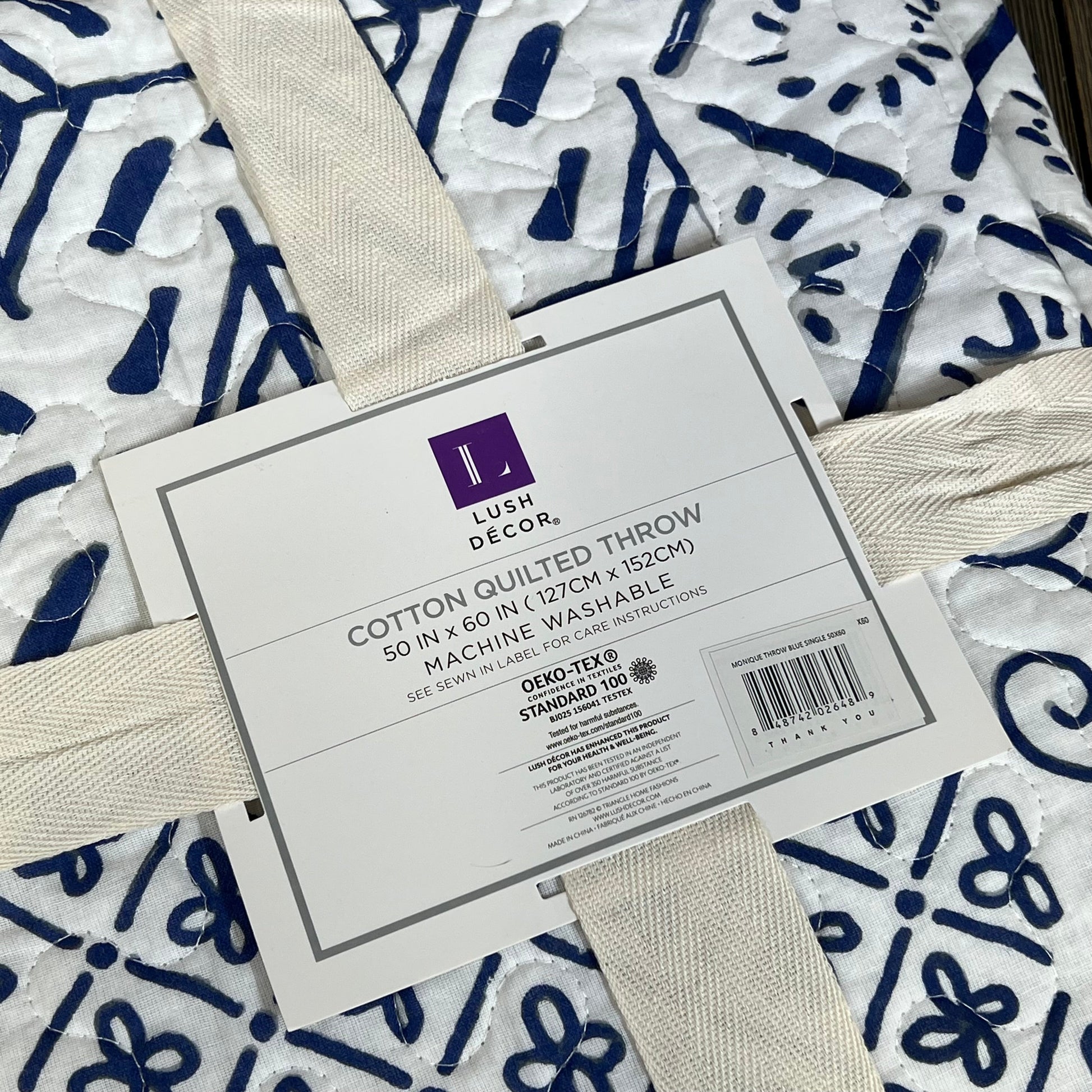 Lush Decor Monique Throw in blue with intricate patterns, 50 x 60 inches, perfect for stylish home decor.