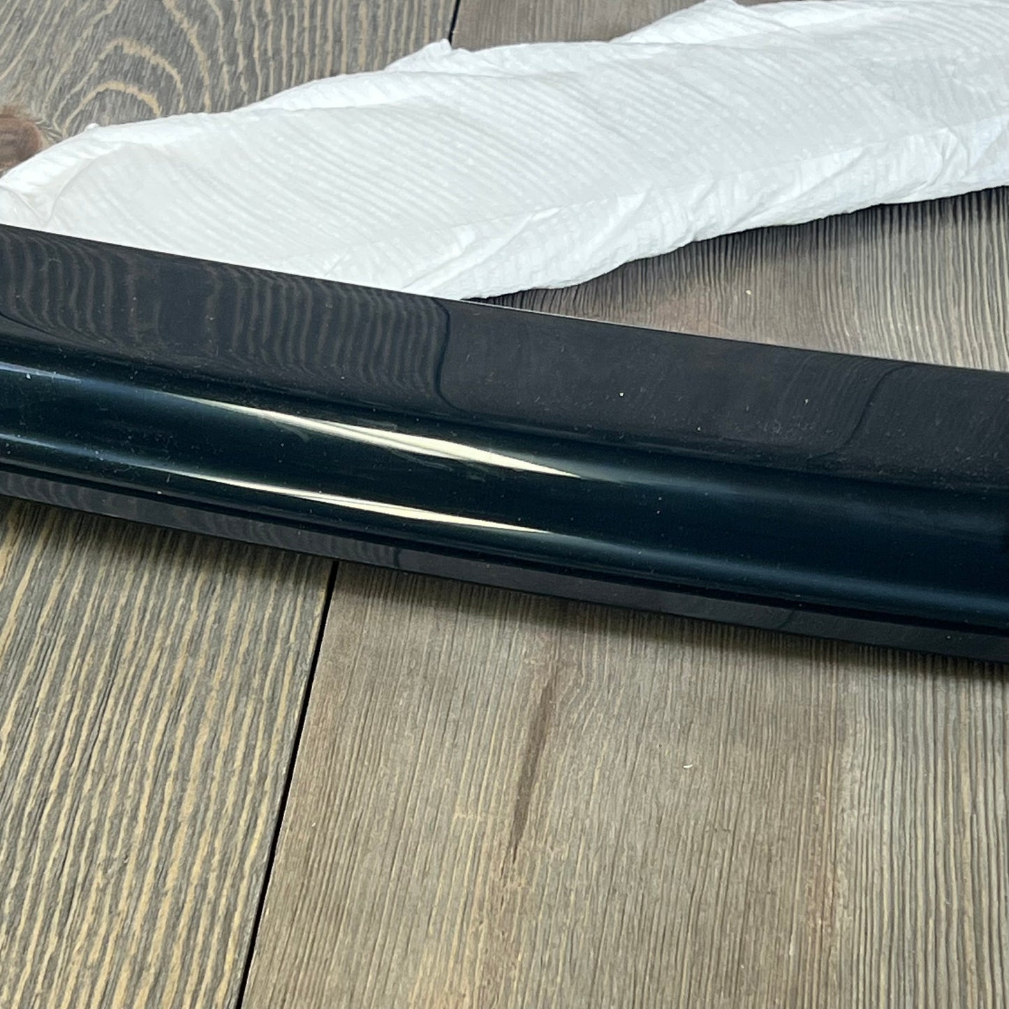 Dark smoke window visor for 2005-2009 Ford Mustang Coupe, showcasing sleek design and UV protection.