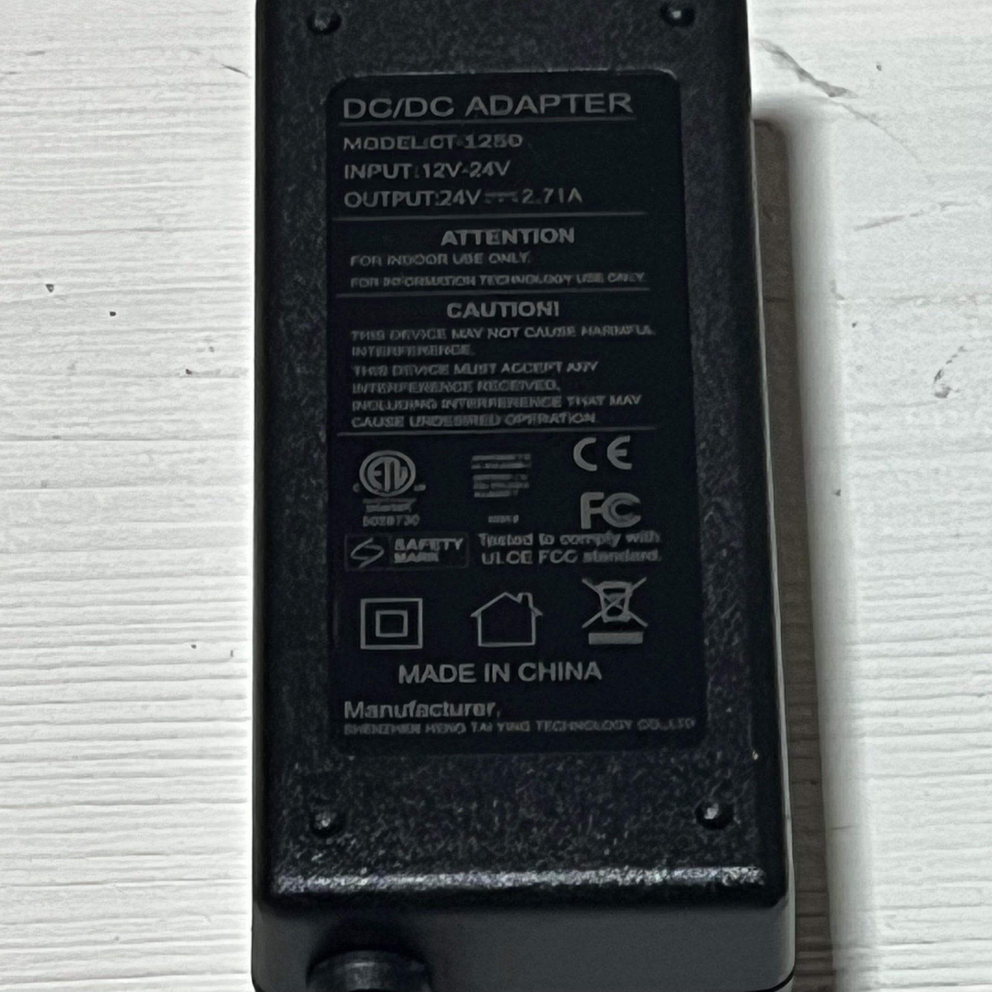 12V DC adapter for Resmed Airsense 11, showcasing model specifications and safety certifications on a white surface.