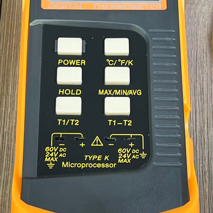 Dual-channel digital thermometer with control buttons for K Type thermocouple, featuring °C/°F/K options and accuracy settings.