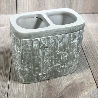 Elegant toothbrush holder with textured gray finish, part of Sweet Home Collection's modern bathroom accessories set.