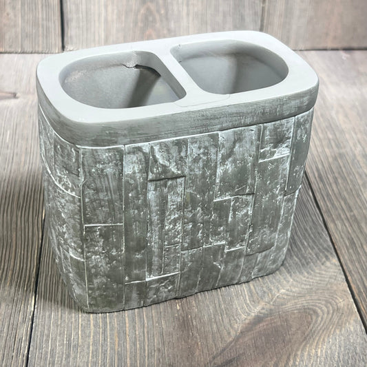 Elegant toothbrush holder with textured gray finish, part of Sweet Home Collection's modern bathroom accessories set.
