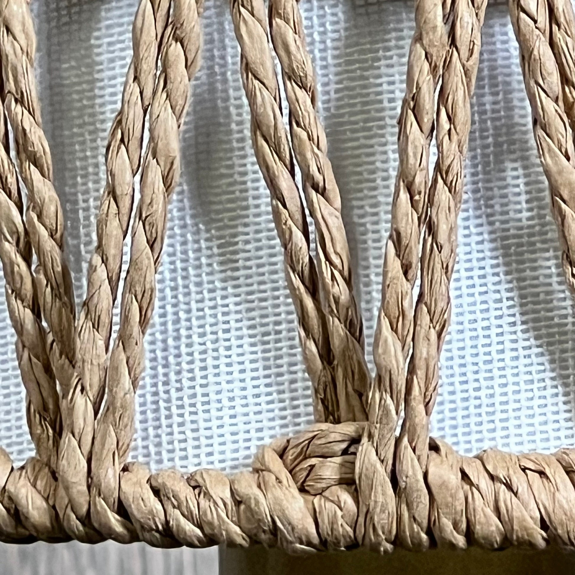 Close-up of the intricate rattan weave on the cordless gold table lamp, showcasing texture and craftsmanship for home decor.