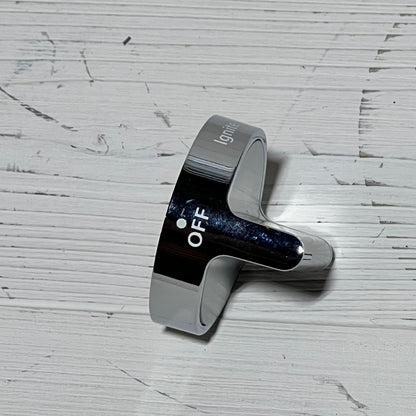 Durable stainless steel gas stove knob replacement for Whirlpool, showing 'OFF' position on a textured surface.