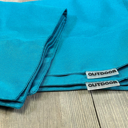 Teal blue waterproof pillow covers for outdoor use, featuring durable material and labeled "outdoor" for garden decor.
