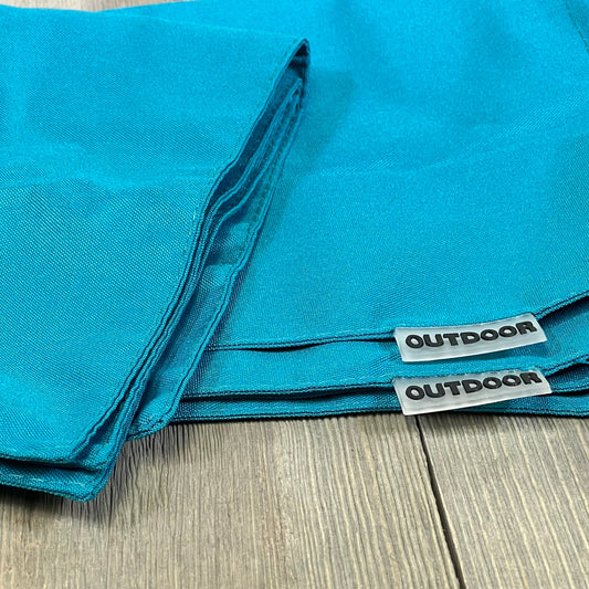 Teal blue waterproof pillow covers for outdoor use, featuring durable material and labeled "outdoor" for garden decor.