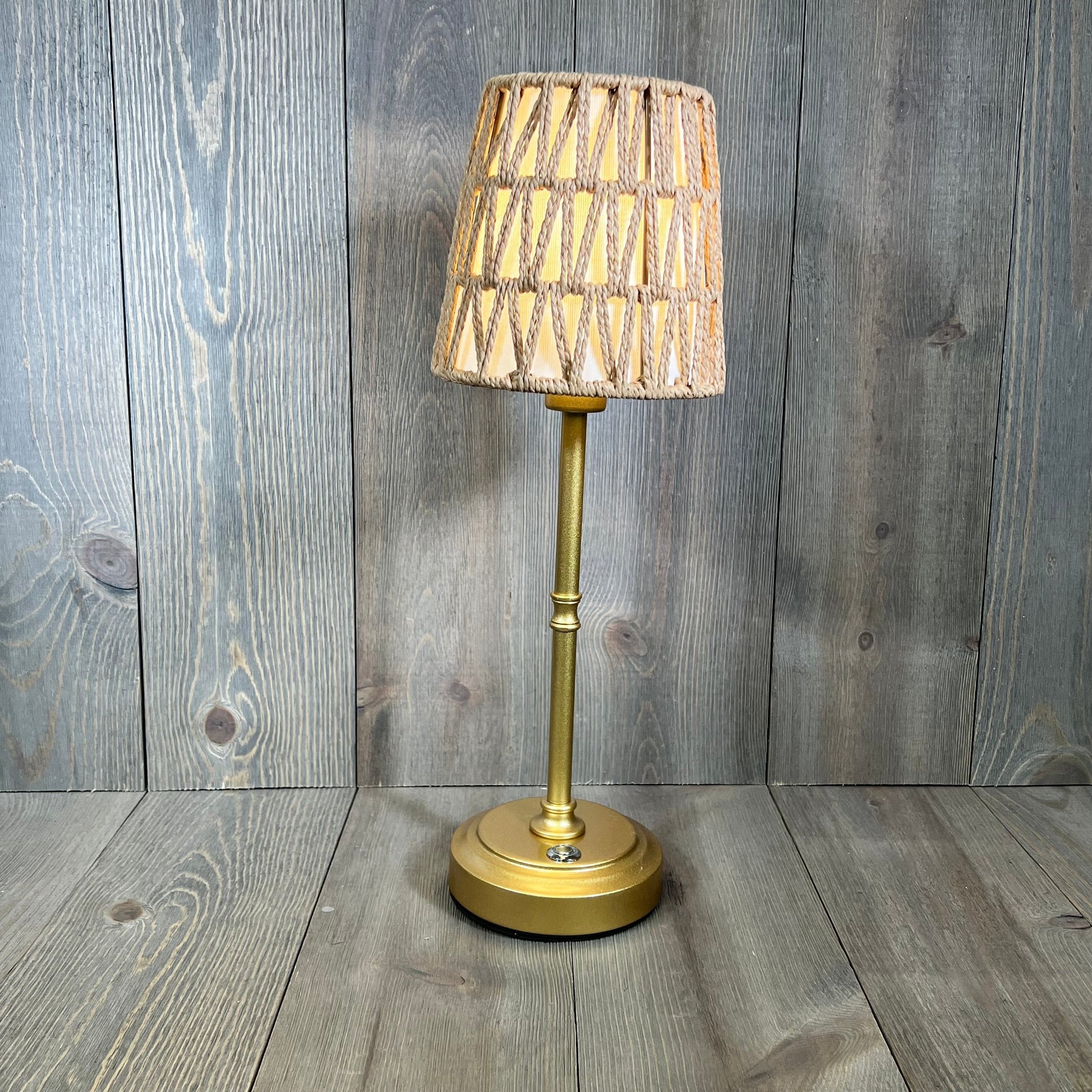Gold rechargeable rattan cordless lamp with touch control, ideal for bedside or nursery decor, featuring stepless dimming.