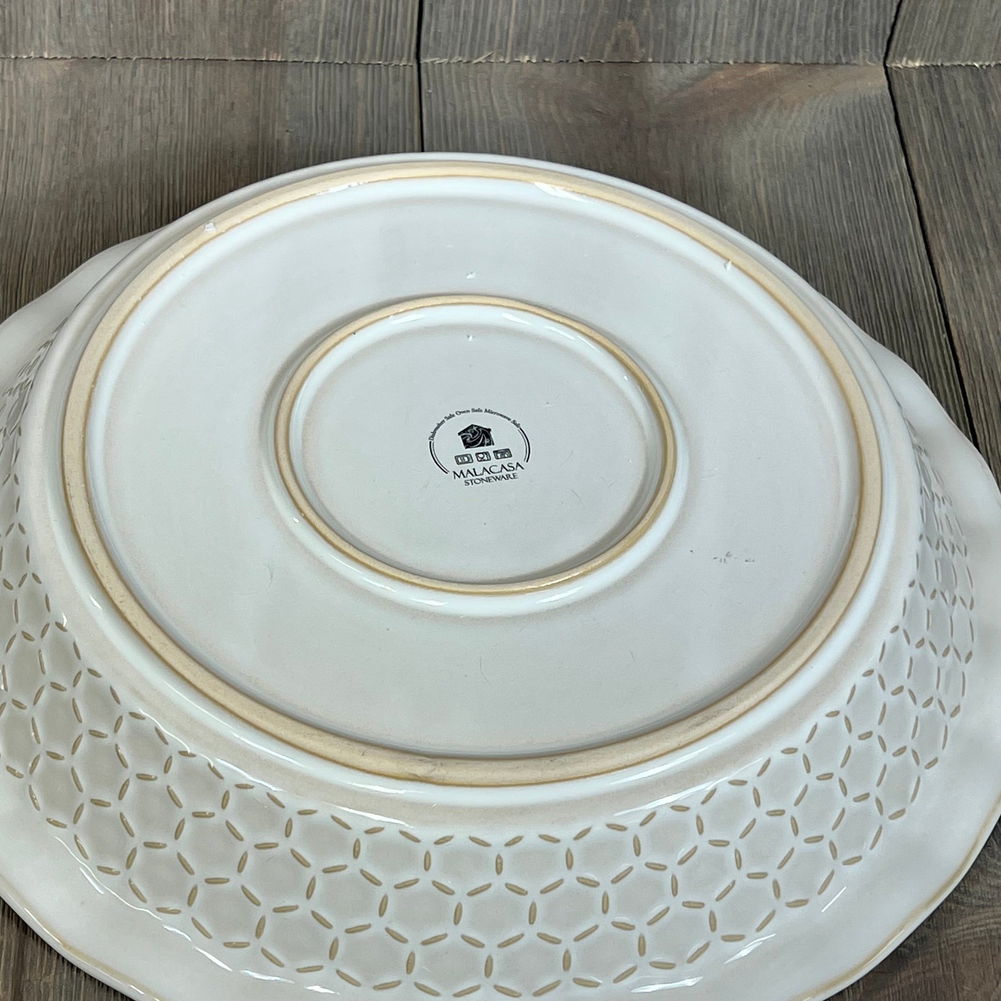 Embossed underside of MALACASA 9-inch stoneware pie dish, showcasing durable craftsmanship and elegant design.