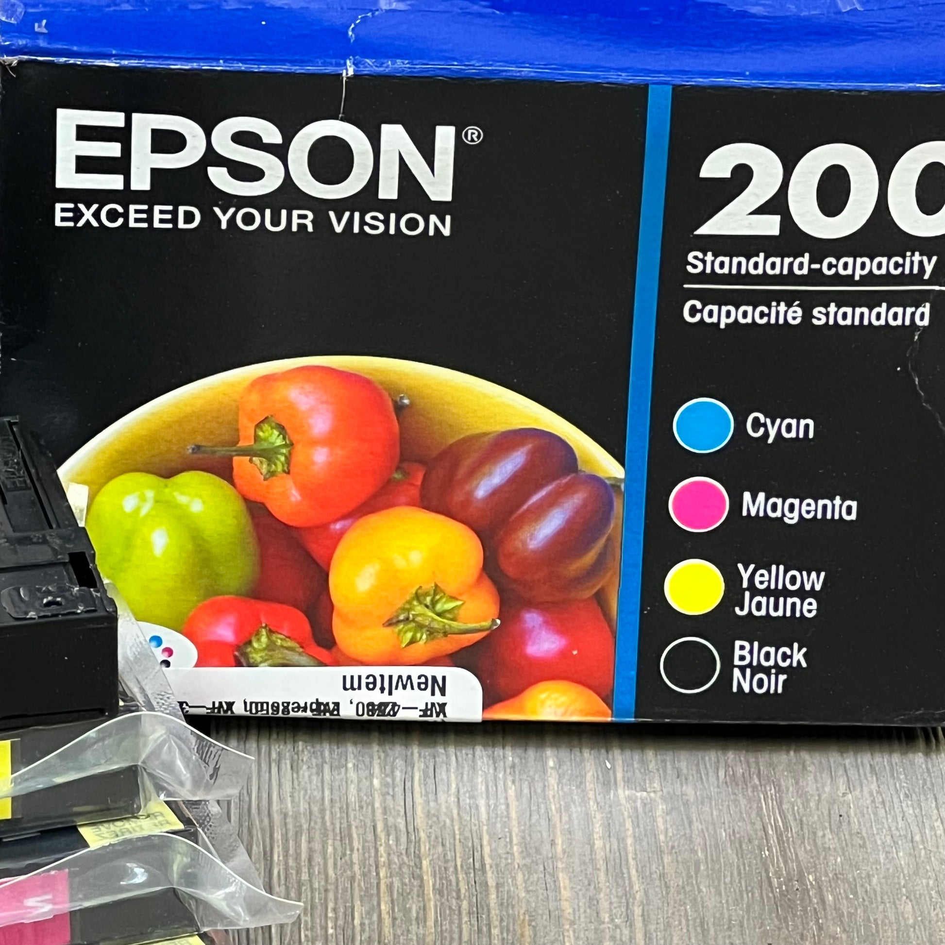 EPSON 220 DURABrite Ultra Ink Combo Pack box with vibrant fruit image, compatible with WorkForce and Expression printers.