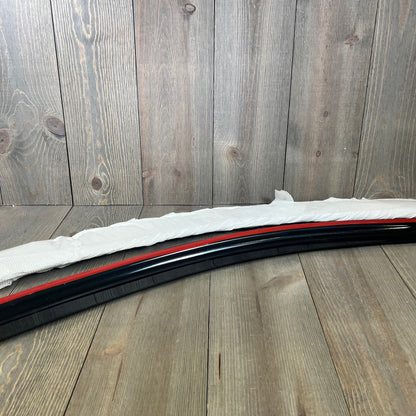 Lightronic dark smoke window visor for 2005-2009 Ford Mustang Coupe, shown with adhesive strip.