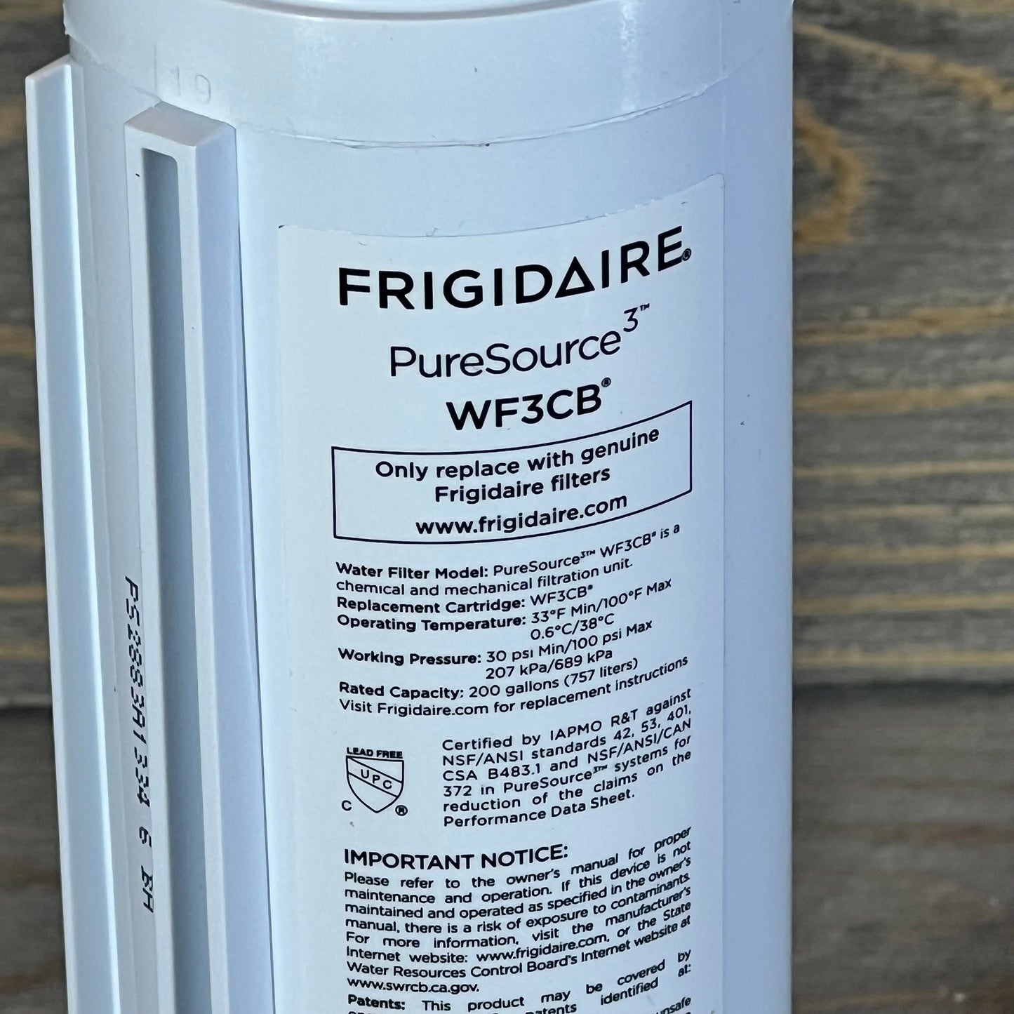 Frigidaire WF3CB PureSource3 water filter close-up with detailed label instructions.