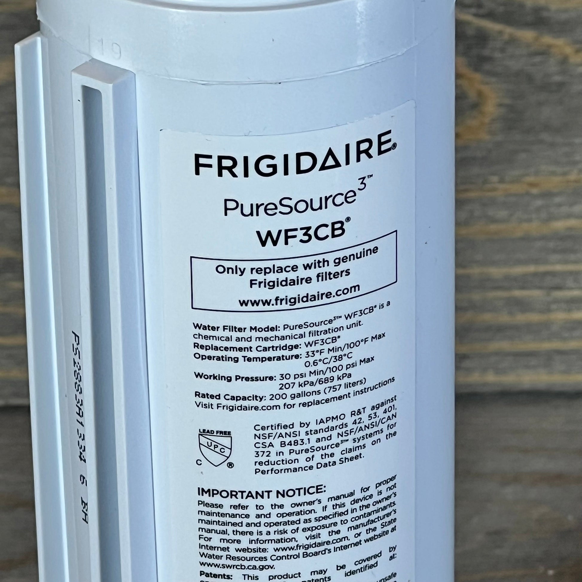 Frigidaire WF3CB PureSource3 water filter close-up with detailed label instructions.