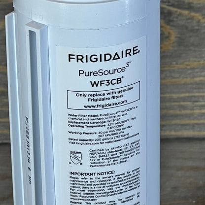 Frigidaire WF3CB PureSource3 water filter close-up with detailed label instructions.