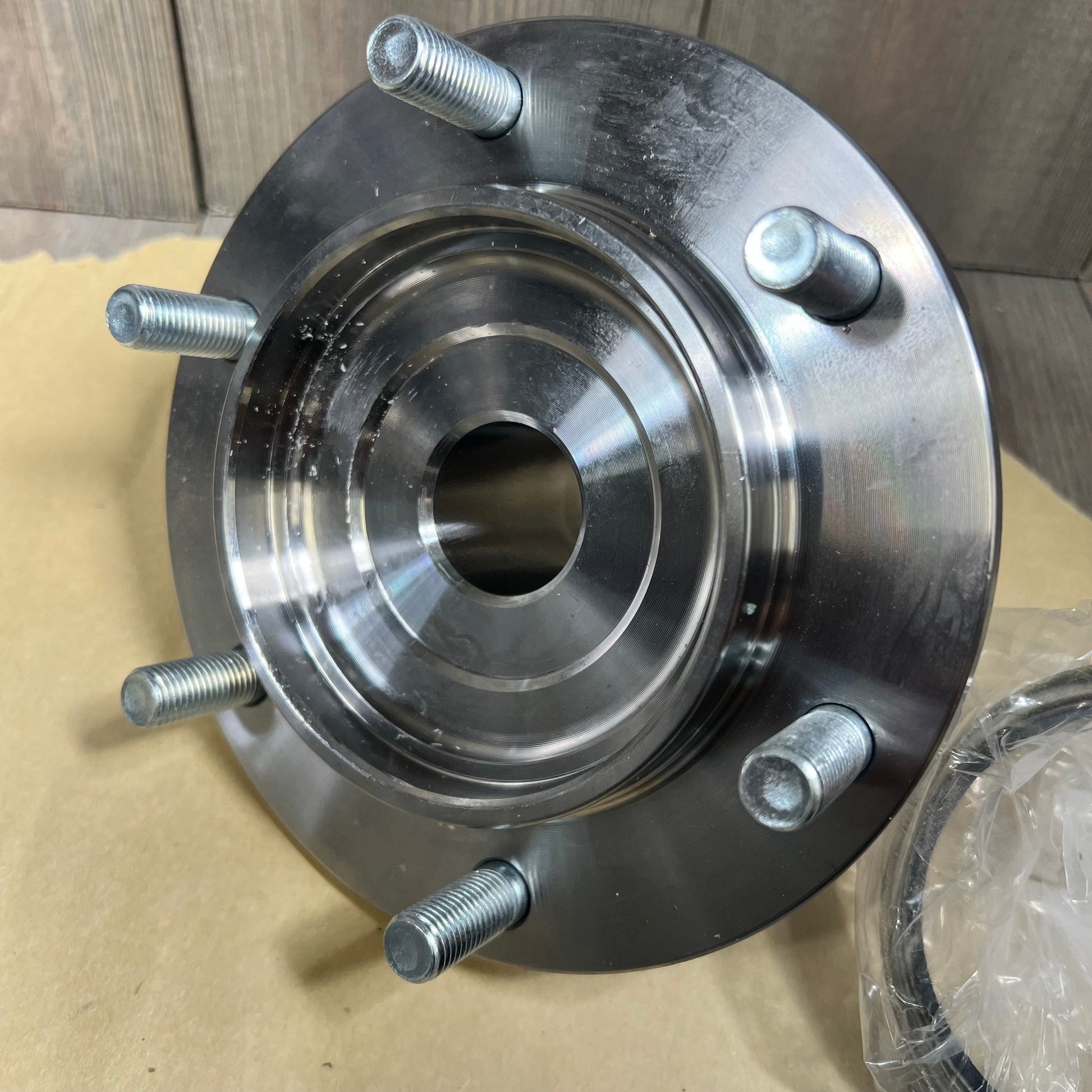 Front view of IRIEQU wheel hub kit for Toyota Tundra and Tacoma, showcasing durable metal construction and bolt design.