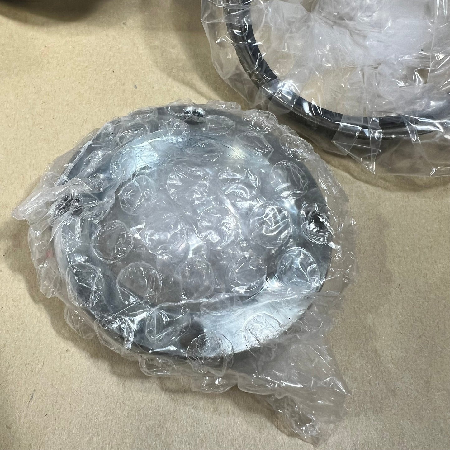 Front wheel hub bearing kit wrapped in bubble wrap for Toyota Tundra 2000-2006, ensuring protection and quality.