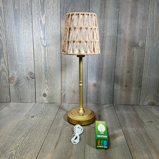 Gold rechargeable rattan cordless table lamp with stepless dimming and E12 bulb, perfect for bedside or nursery.