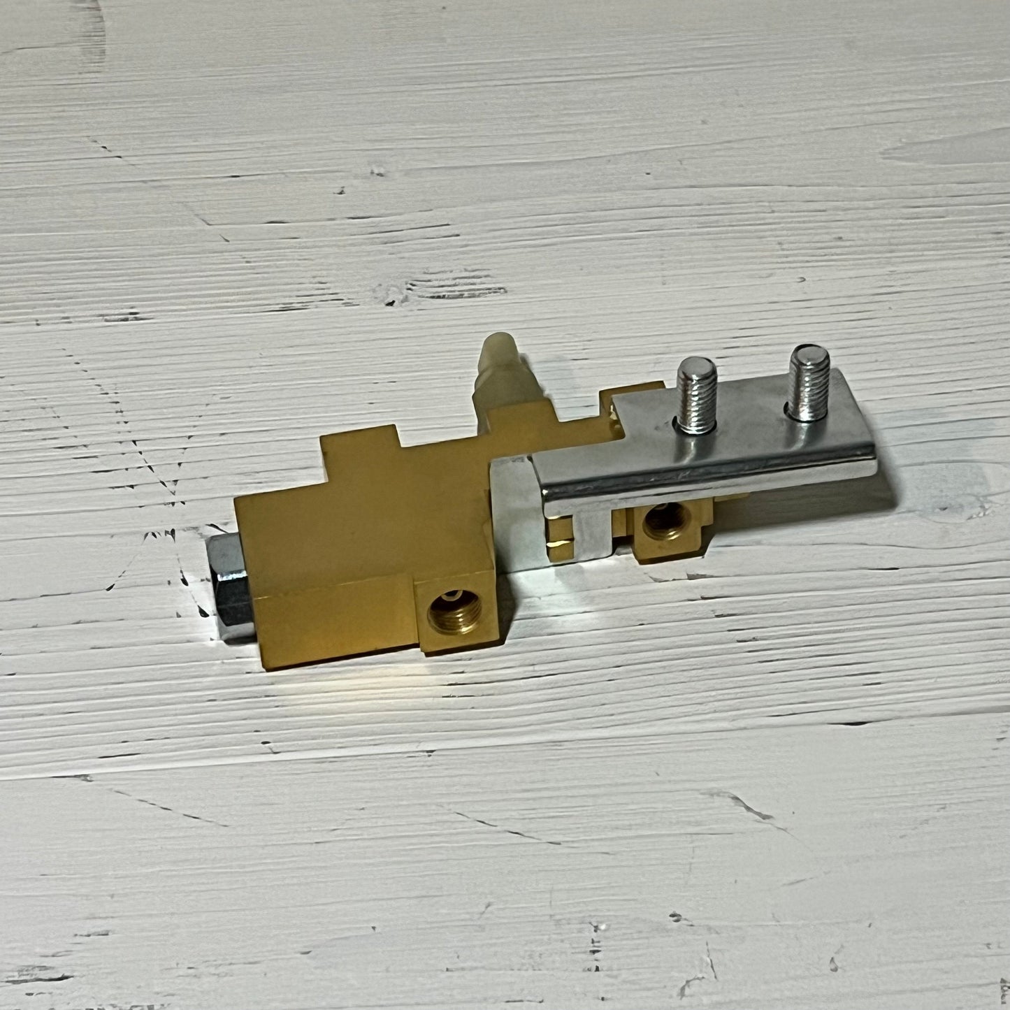 Gold and silver brake proportioning valve PV6070FD for Ford Mustang 1964-1970 on a white surface.