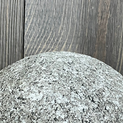 Modern gray polyresin sculpture with textured surface, ideal for contemporary home decor and artistic displays.