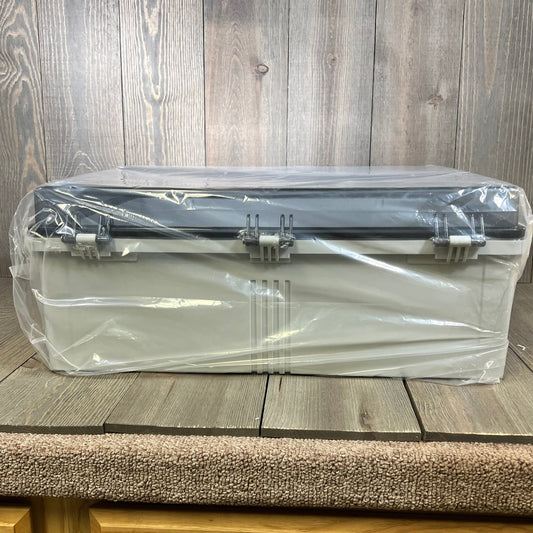 Waterproof junction box with clear hinged cover, showcasing sturdy design for outdoor electrical projects.