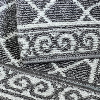 Gray and white geometric pattern on HEBE indoor door mat, 32"x48", non-slip and washable for entryways and hallways.