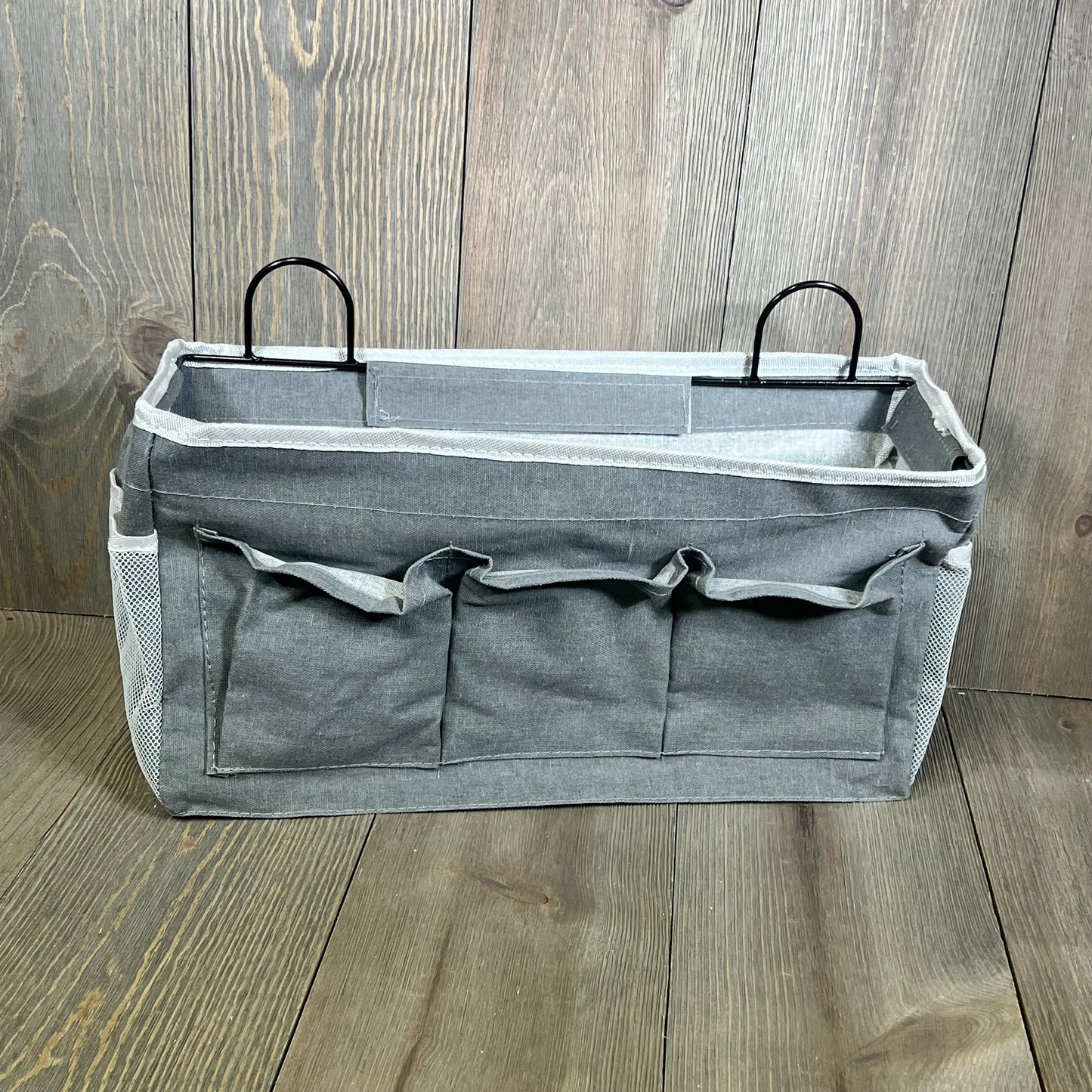 Gray Kanrichu wall hanging organizer with 3 pockets, made from durable linen fabric, perfect for versatile storage in any room.