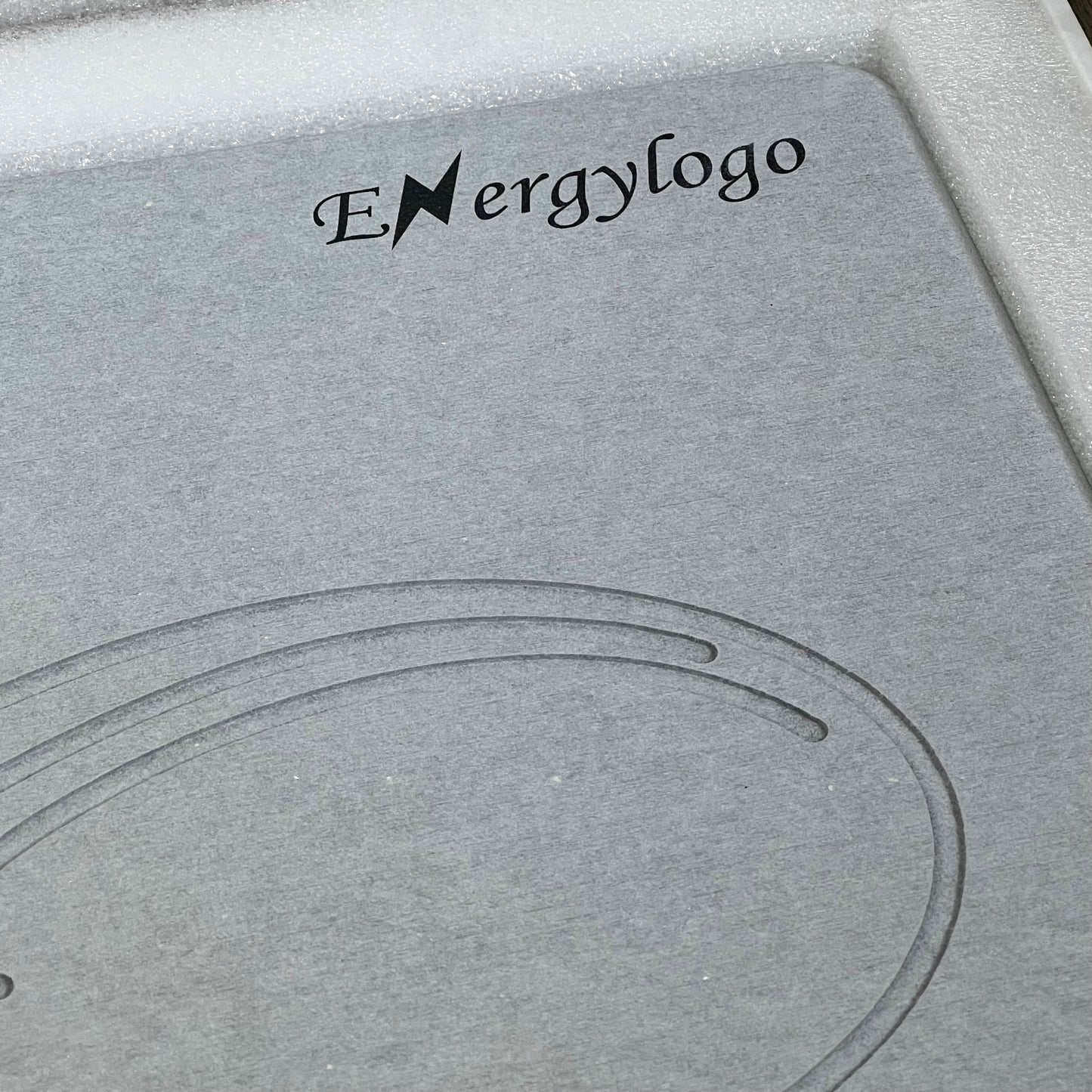Grey ENERGYLOGO stone bath mat with infinity design, featuring quick-drying diatomaceous earth for bathroom floors.