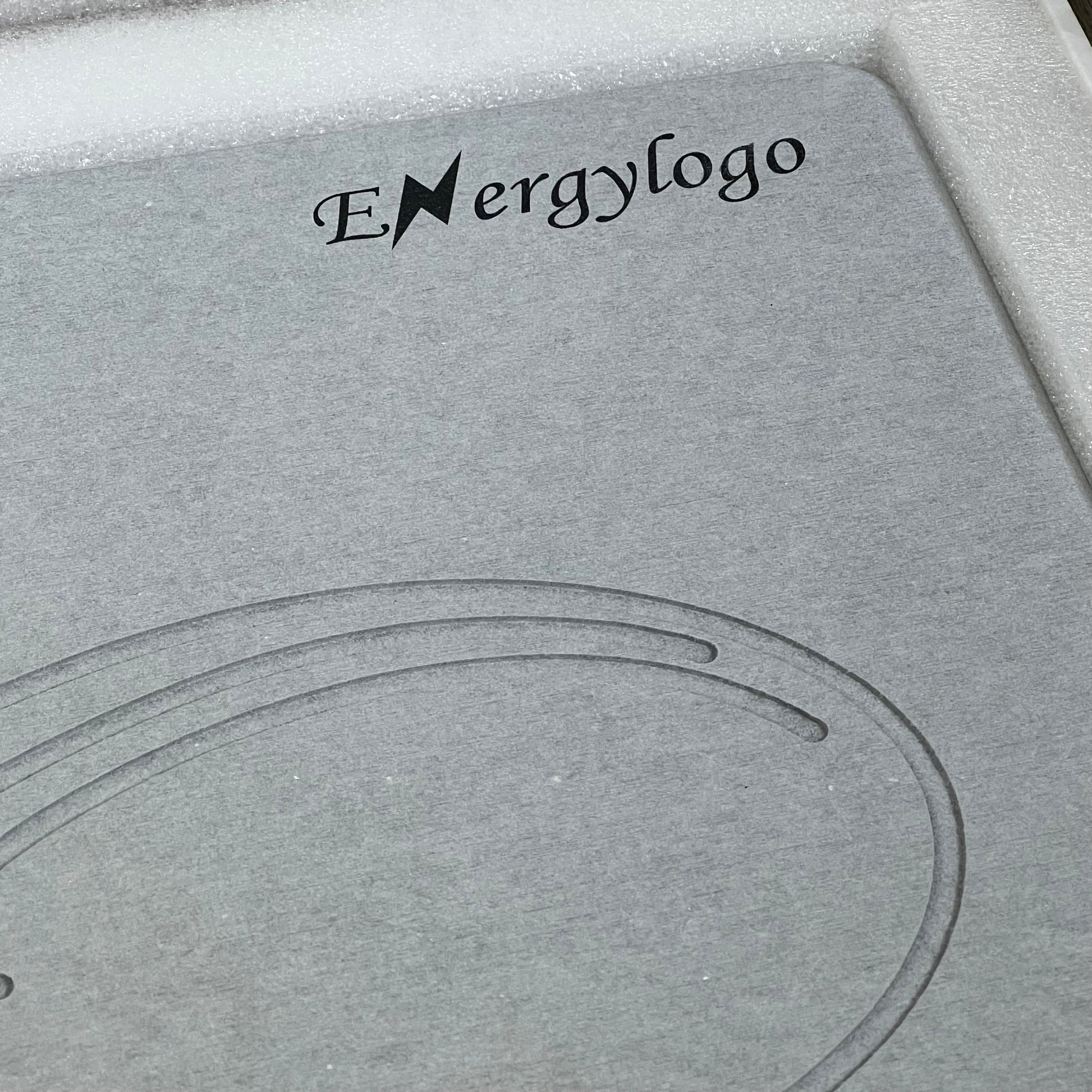 Grey ENERGYLOGO stone bath mat with infinity design, featuring quick-drying diatomaceous earth for bathroom floors.